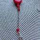Red beadable badge reel
